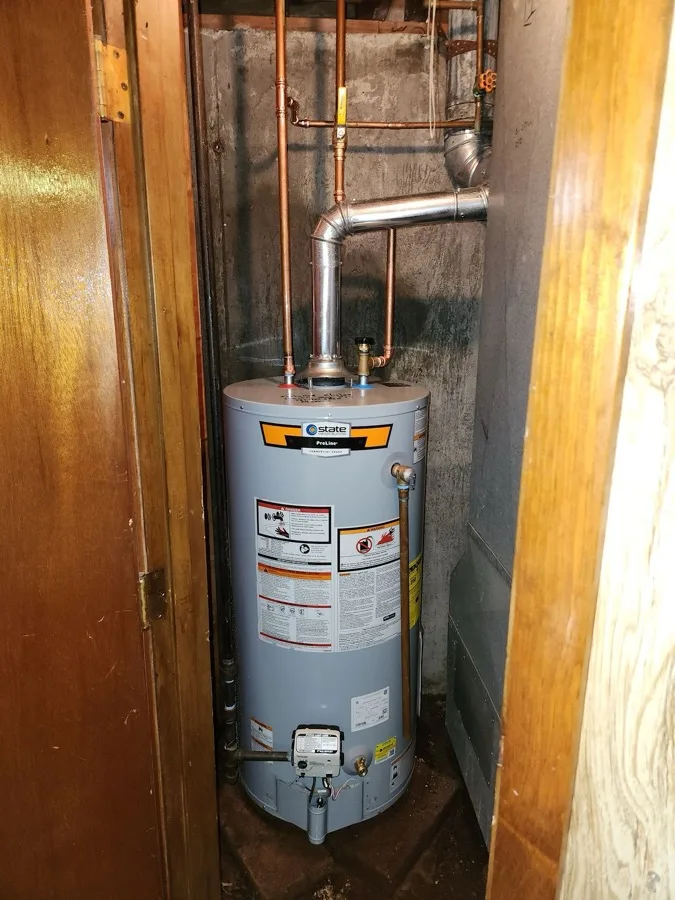 Water heater installed in a tight closet by Country Ways Plumbing